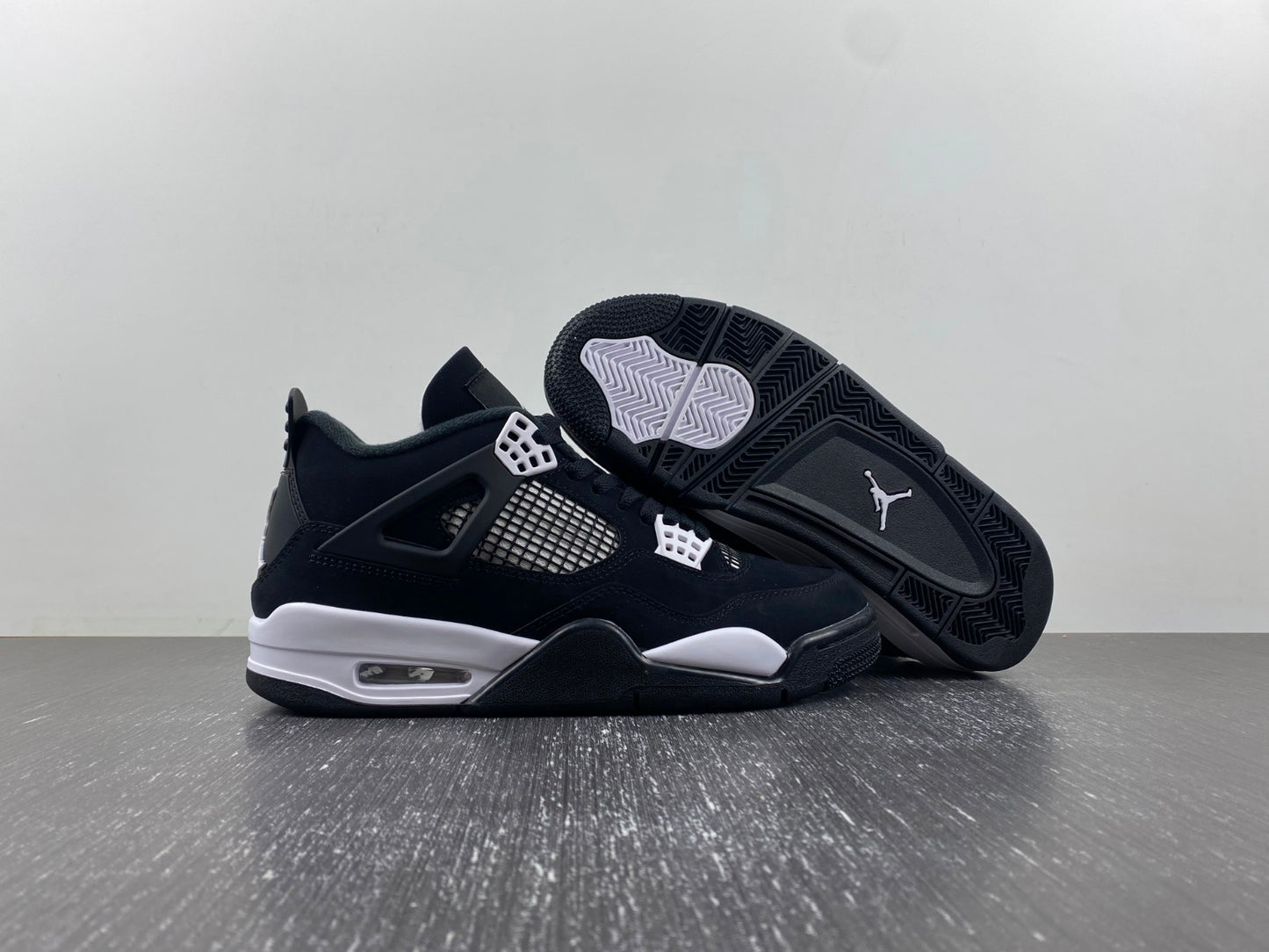 Air Jordan 4 Retro “Black & White” – Clean Classic Street Style Sneakers