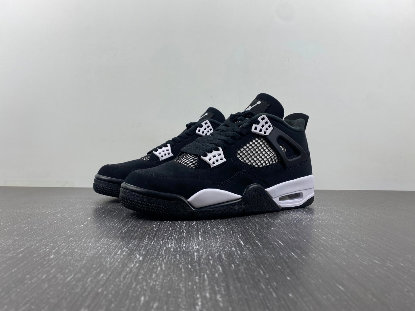 Air Jordan 4 Retro “Black & White” – Clean Classic Street Style Sneakers