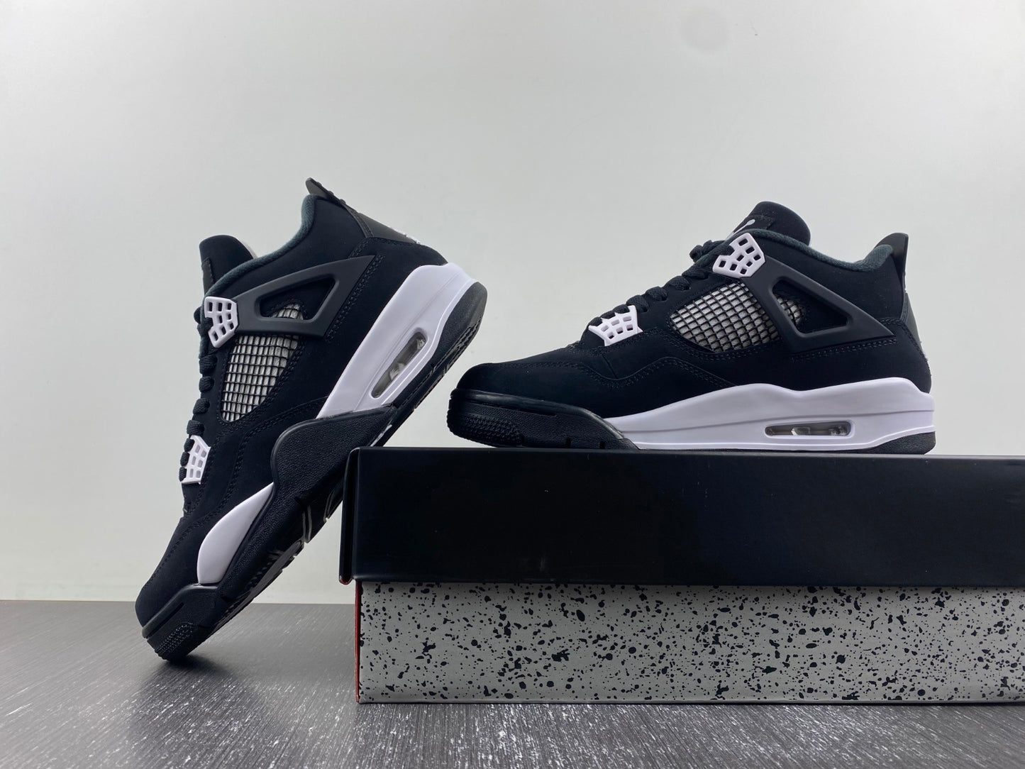 Air Jordan 4 Retro “Black & White” – Clean Classic Street Style Sneakers