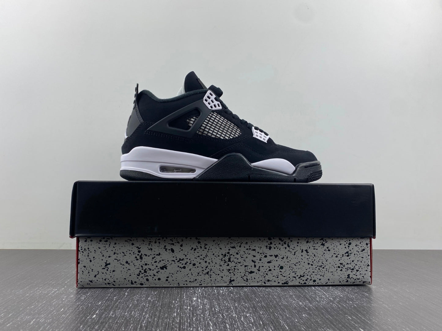 Air Jordan 4 Retro “Black & White” – Clean Classic Street Style Sneakers