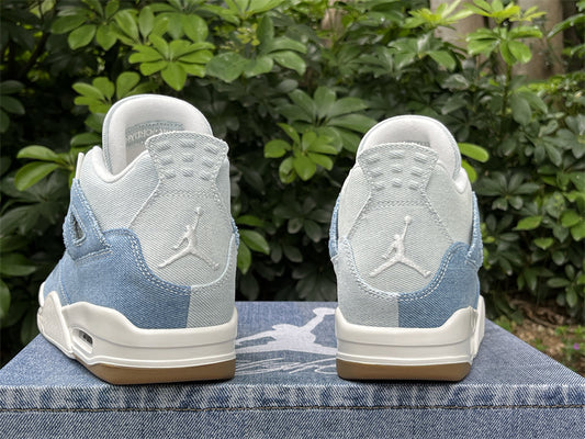 **Title:** Air Jordan 4 Retro Denim Blue & White Sneakers 👟💙
