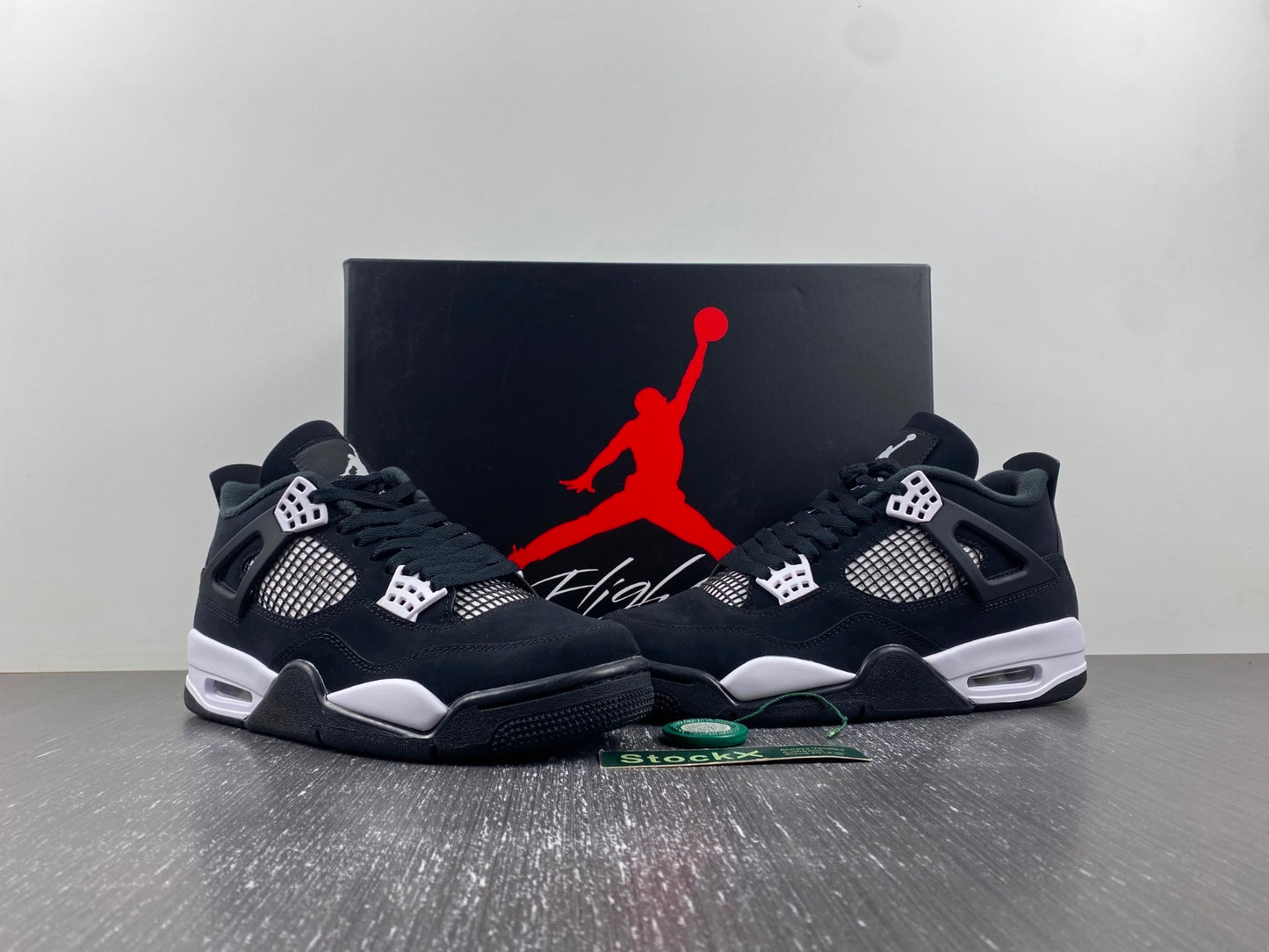 Air Jordan 4 Retro “Black & White” – Clean Classic Street Style Sneakers