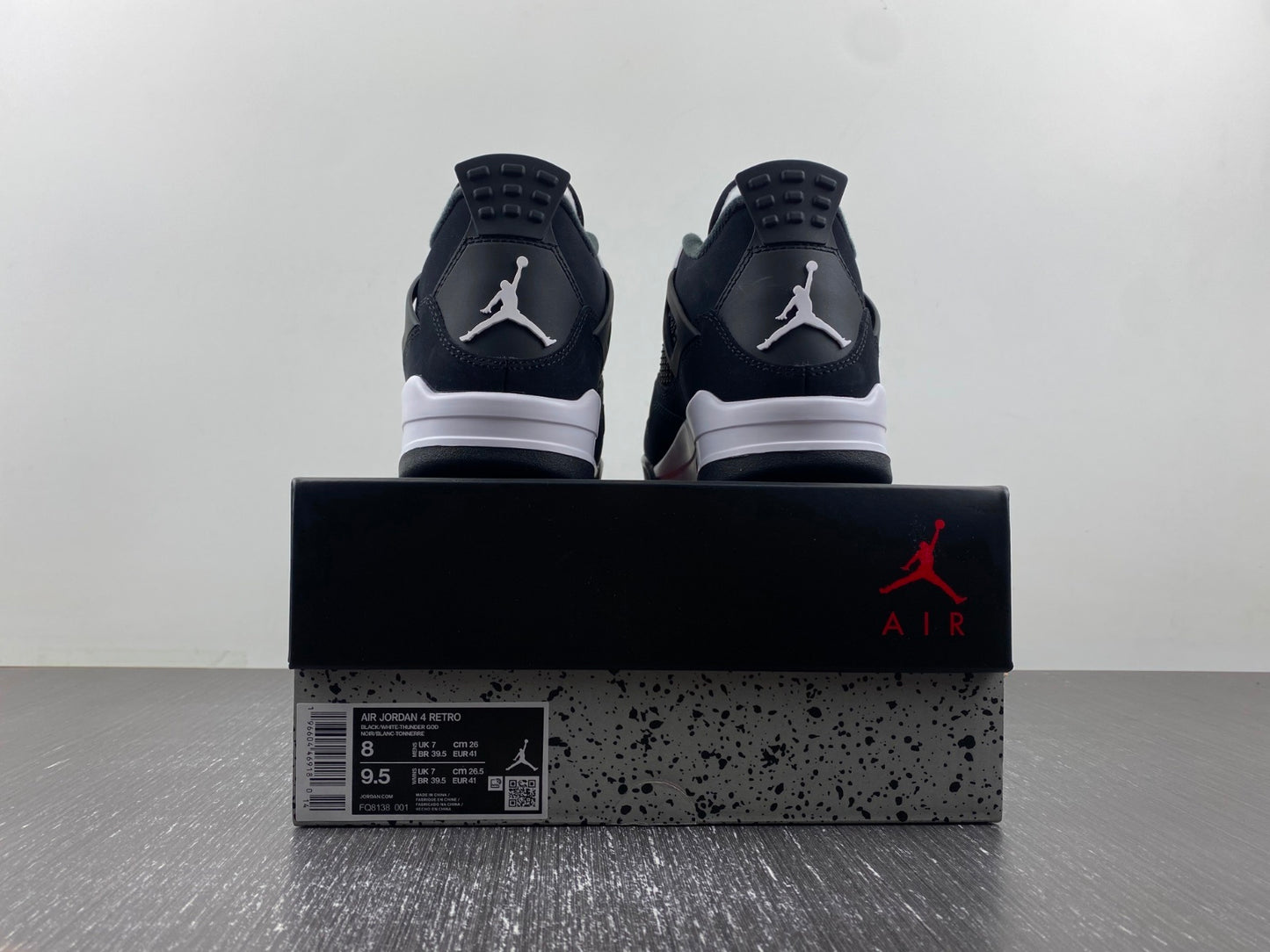 Air Jordan 4 Retro “Black & White” – Clean Classic Street Style Sneakers